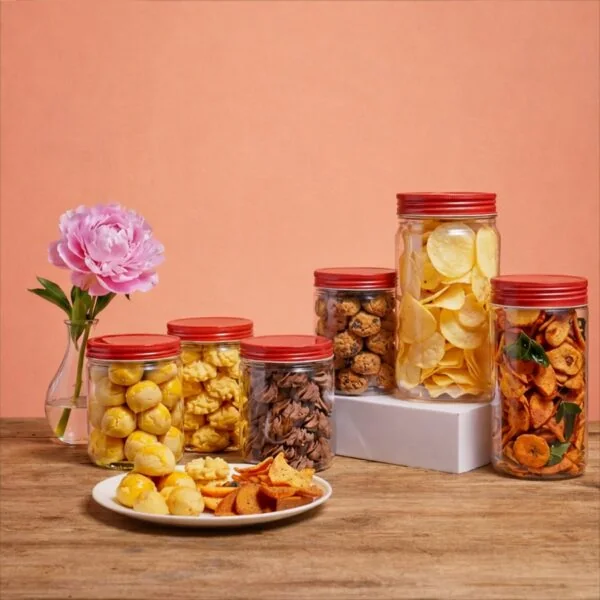 Six jars of Ding Bakery goodies with pineapple tarts served on a plate.